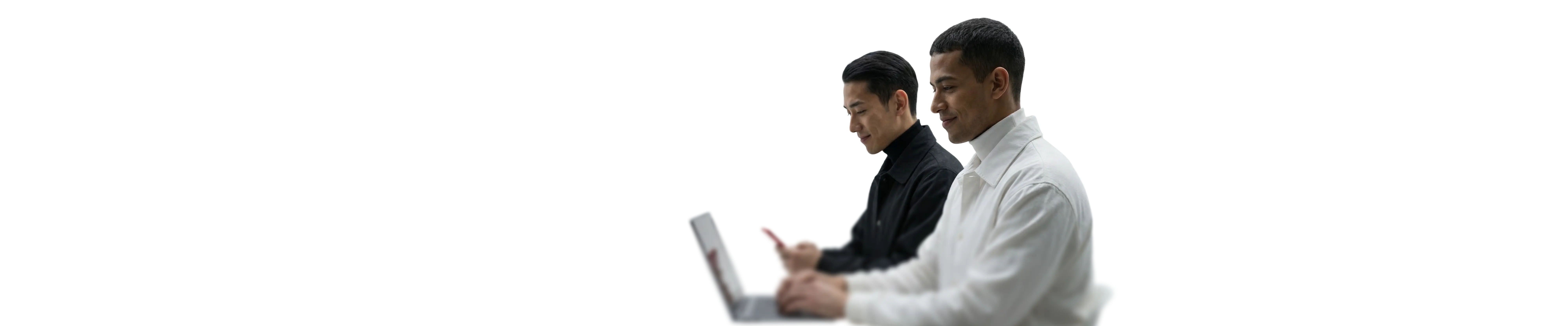 people using trading app on laptops and smartphones
